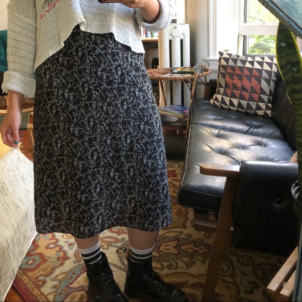 Kensie midi skirts w/ abstract faces